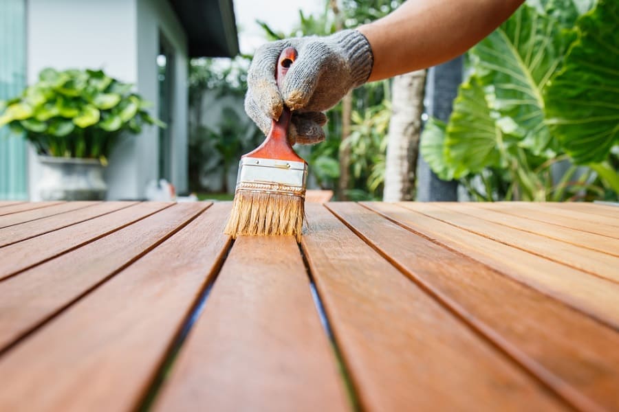 Applying waterproof coating to wood furniture