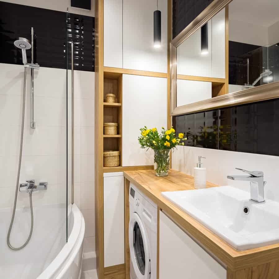 Black,And,White,Bathroom,With,Shower,And,Wooden,Cabinet